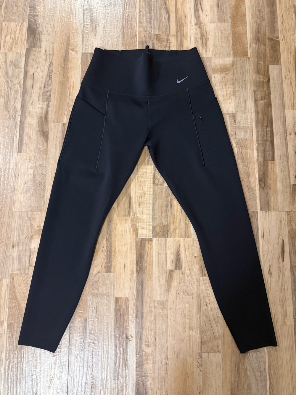 Nike Black High-Rise womans Leggings with Side Zipper Pockets
